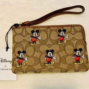 Coach Disney wristlet. New with tag.